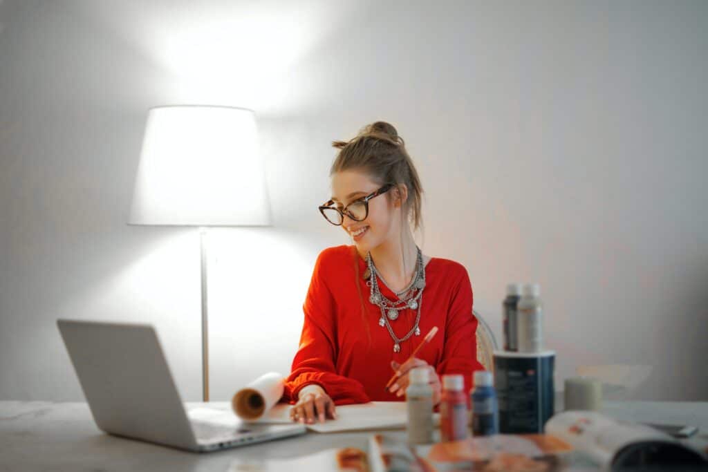Photo by Andrea Piacquadio: https://www.pexels.com/photo/woman-in-red-long-sleeve-shirt-looking-at-her-laptop-3765132/