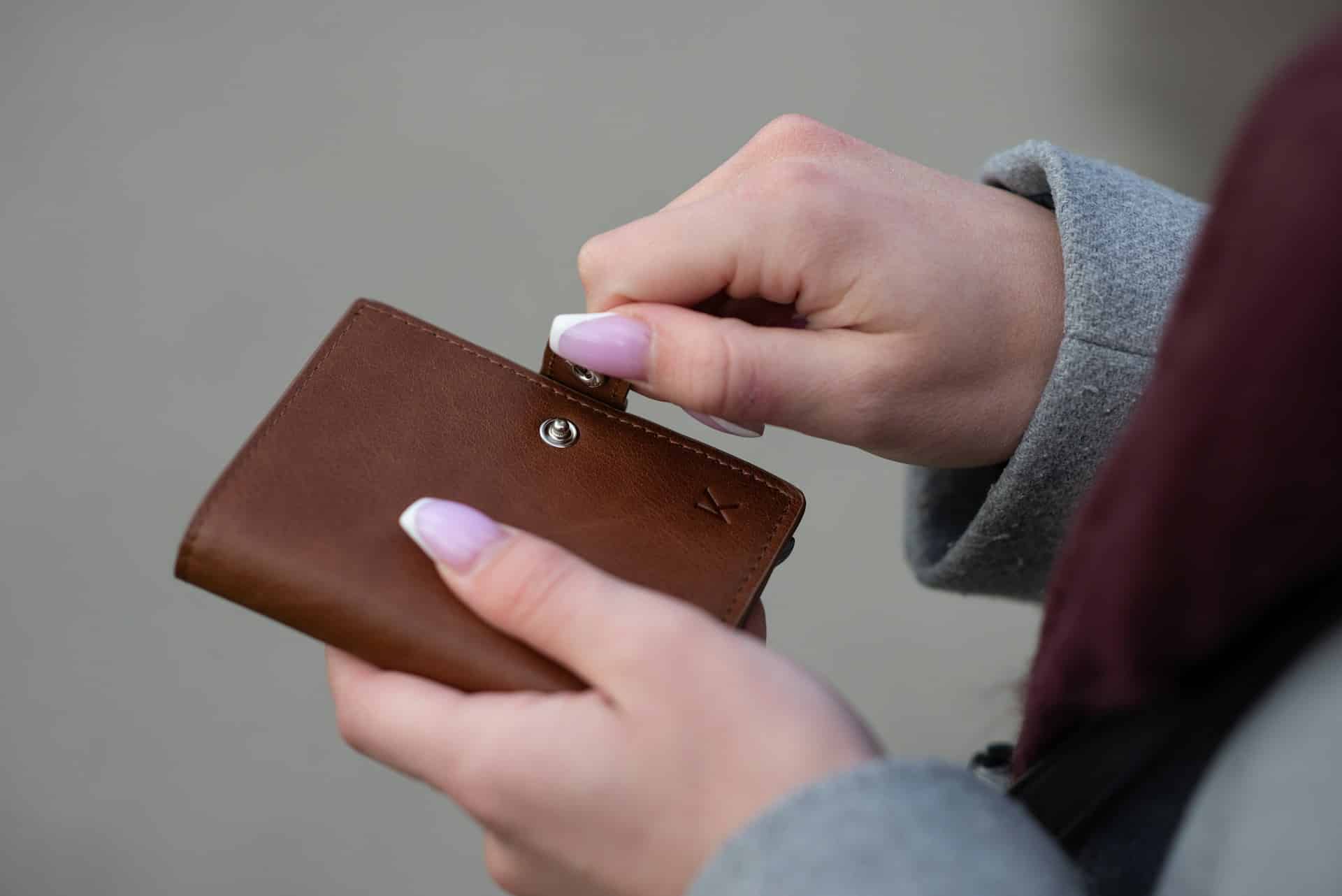 woman holding her wallet