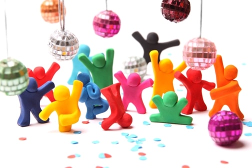 Tiny cartoon people dancing around under disco balls