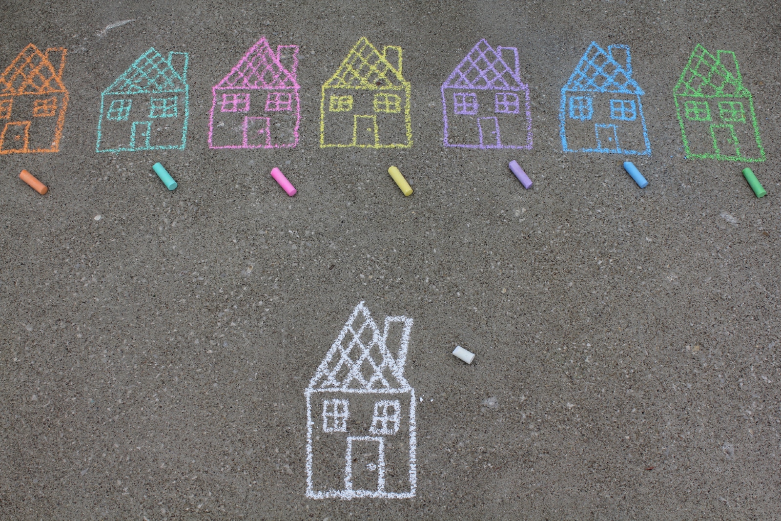 Houses drawn in chalk on the ground