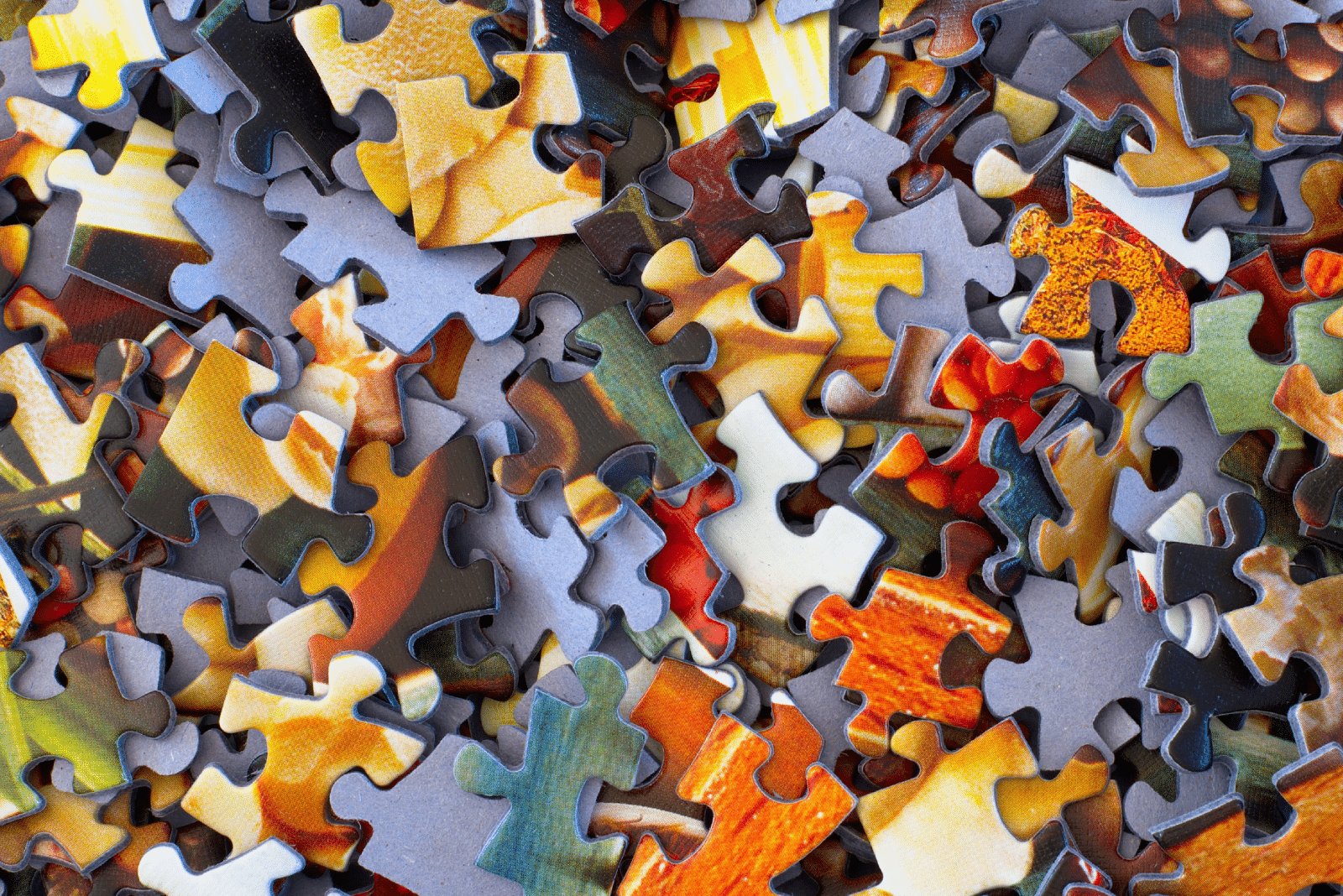 Puzzle pieces in a pile