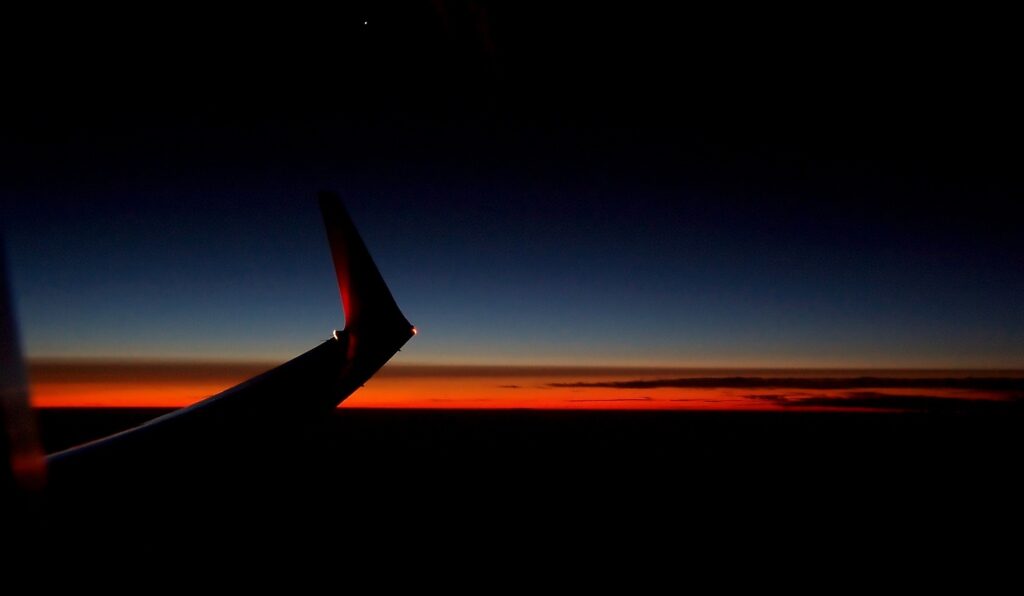 Plane Wing with Sunset
