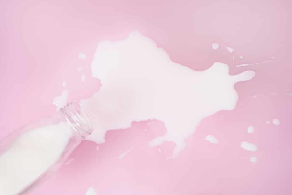 Milk spilt from bottle