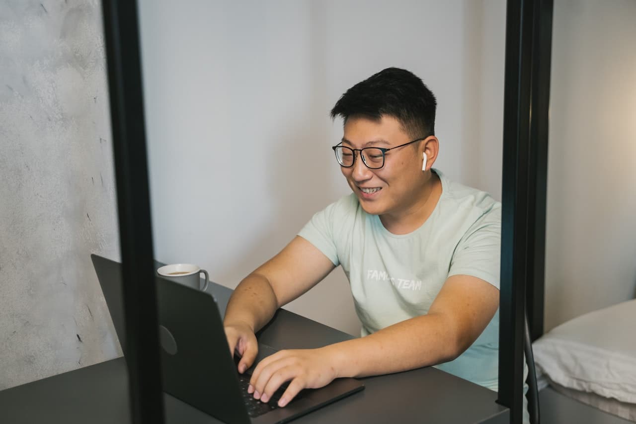 young man using laptop