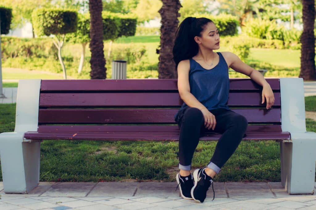 girl sitting on a bench