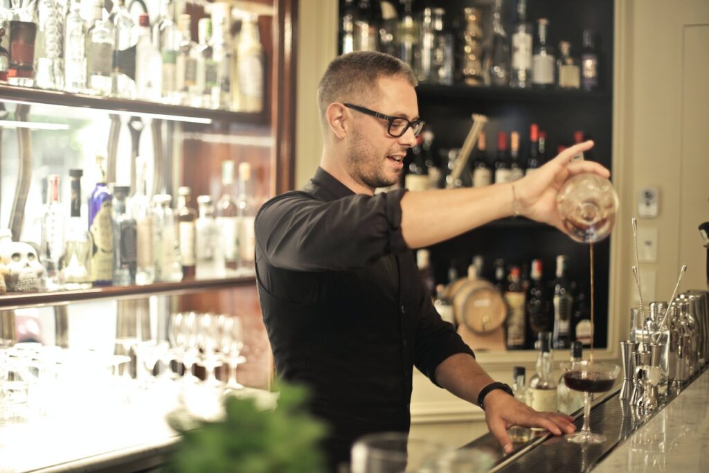 Barman serving drinks