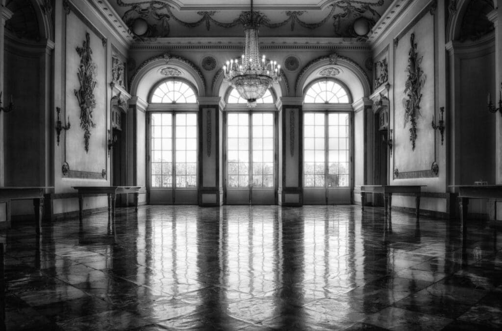 Inside a mansion, black and white