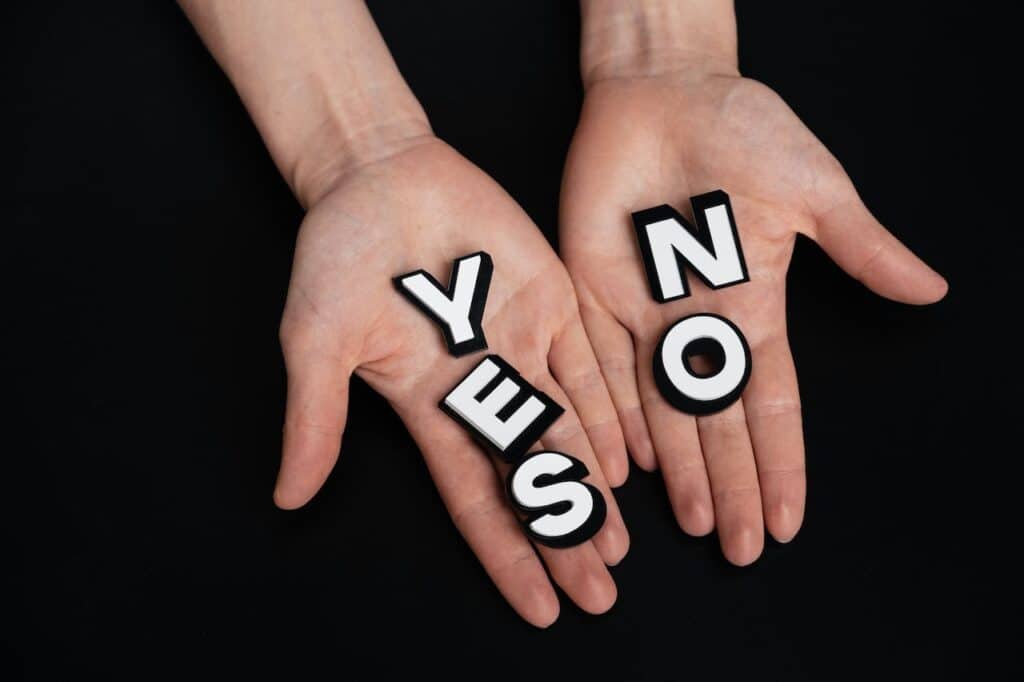Yes and No words on hands