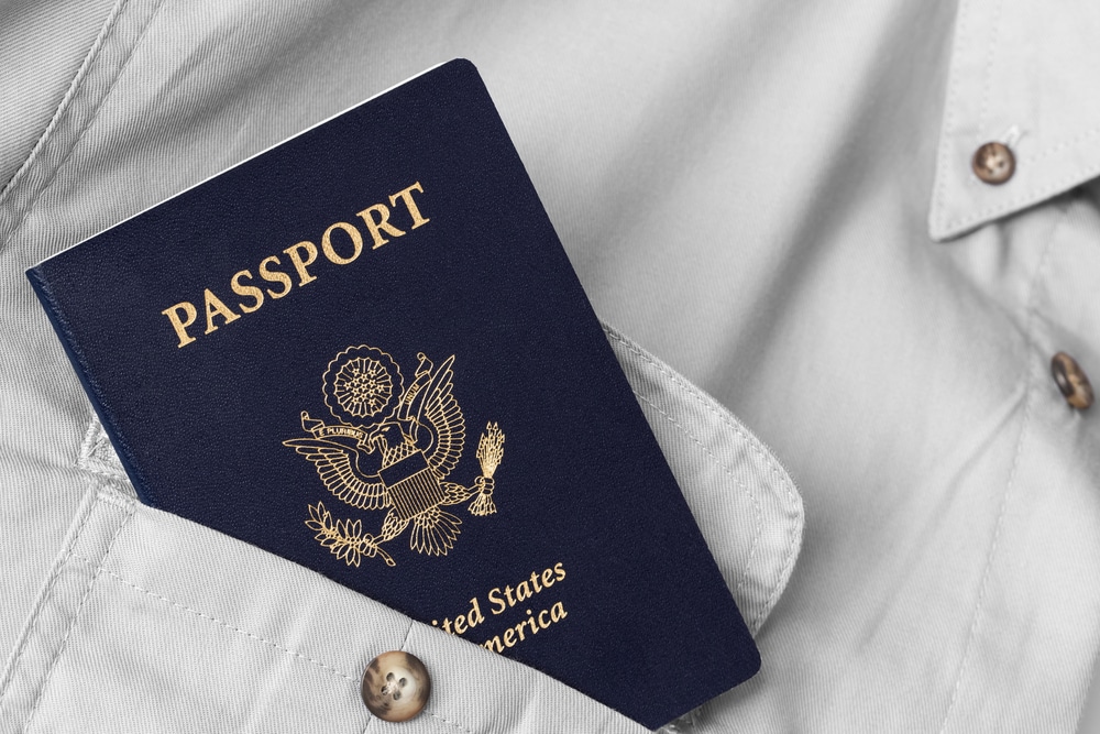 passport tucked into a man's pocket