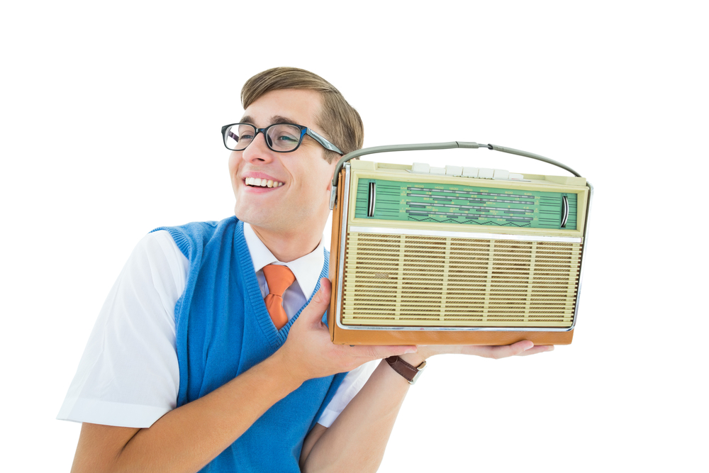 Man listening to a radio