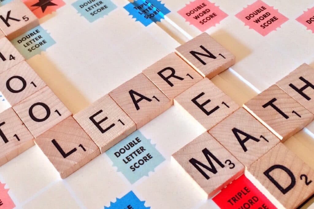 Scrabble tiles reading 'learn,' 'read' and 'math'