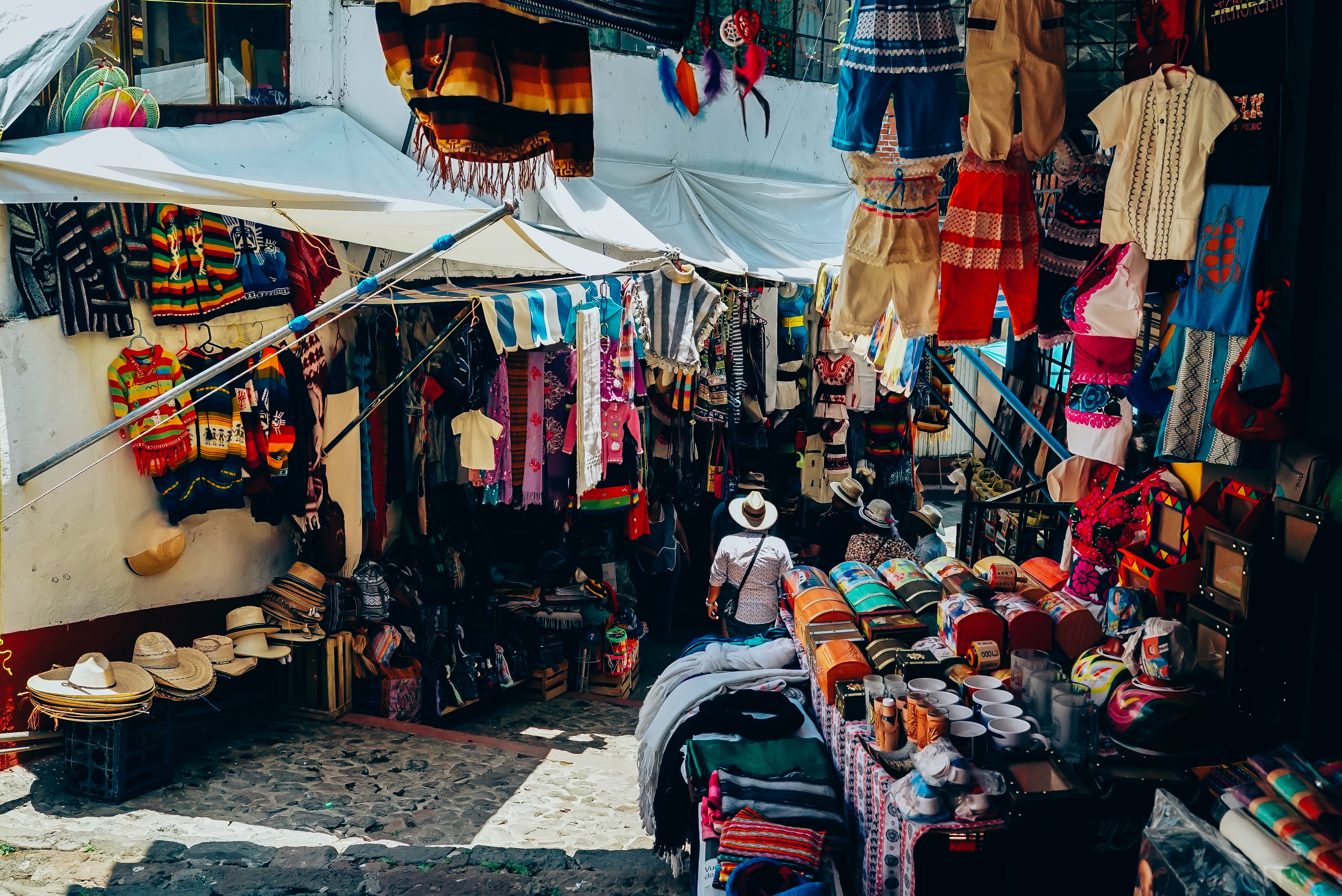 Photo by Ricky Esquivel: https://www.pexels.com/photo/assorted-color-clothes-display-on-street-1745747/