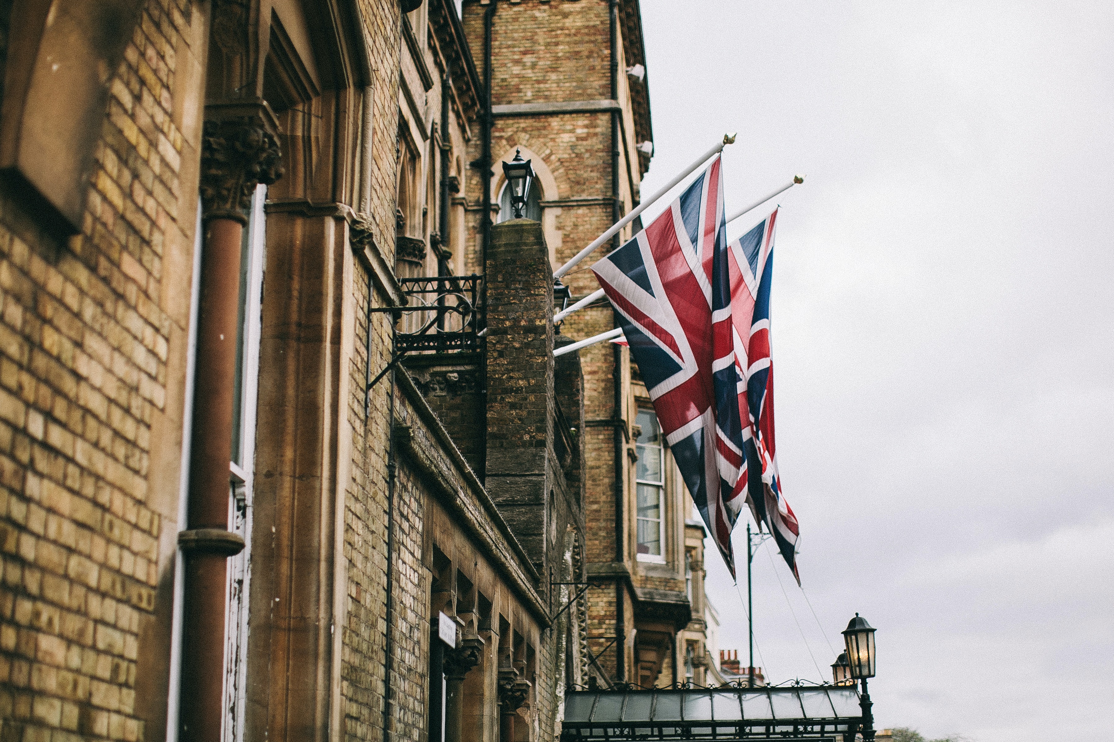 A British flag hangs on a building in London