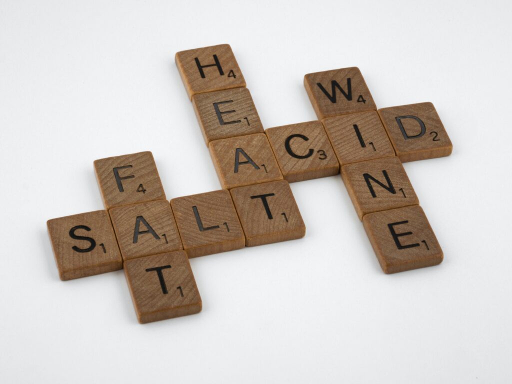 scrabble-tiles-spelling-out-the-words-salt-fat-heat-acid-and-wine