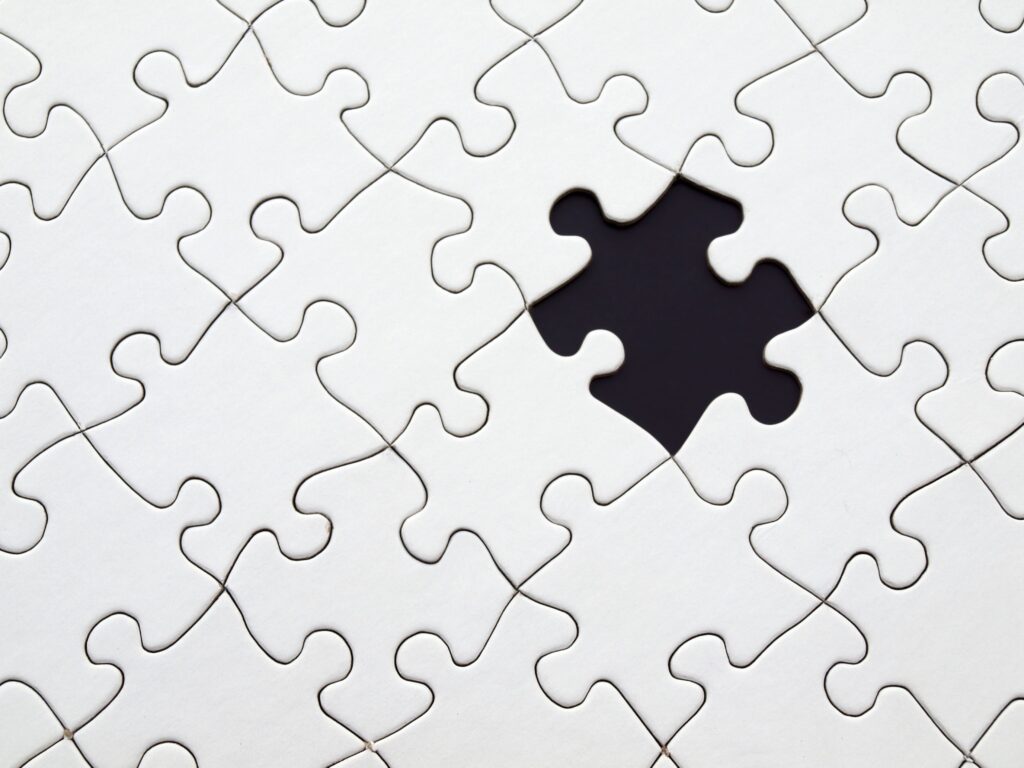 white-jigsaw-puzzle-with-one-missing-piece