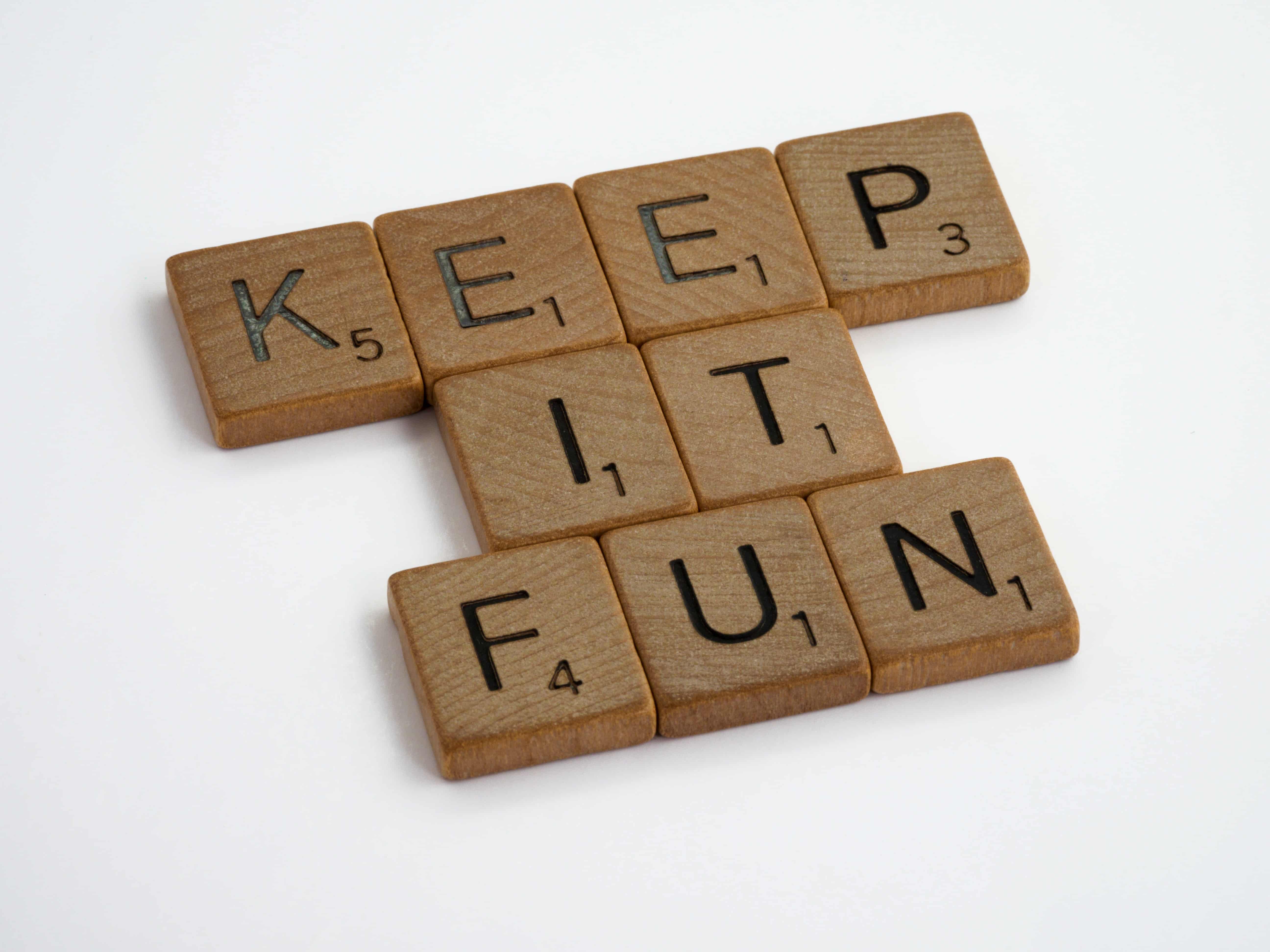 Scrabble letters spelling out "keep it fun"