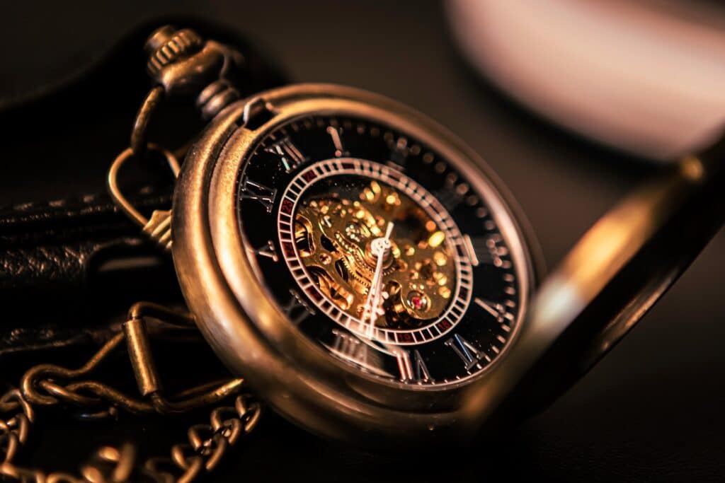 closeup-shot-of-gold-pocketwatch