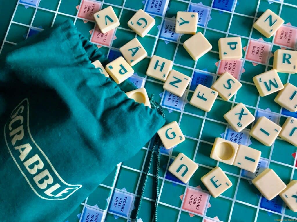 Scrabble letters on a Scrabble game board
