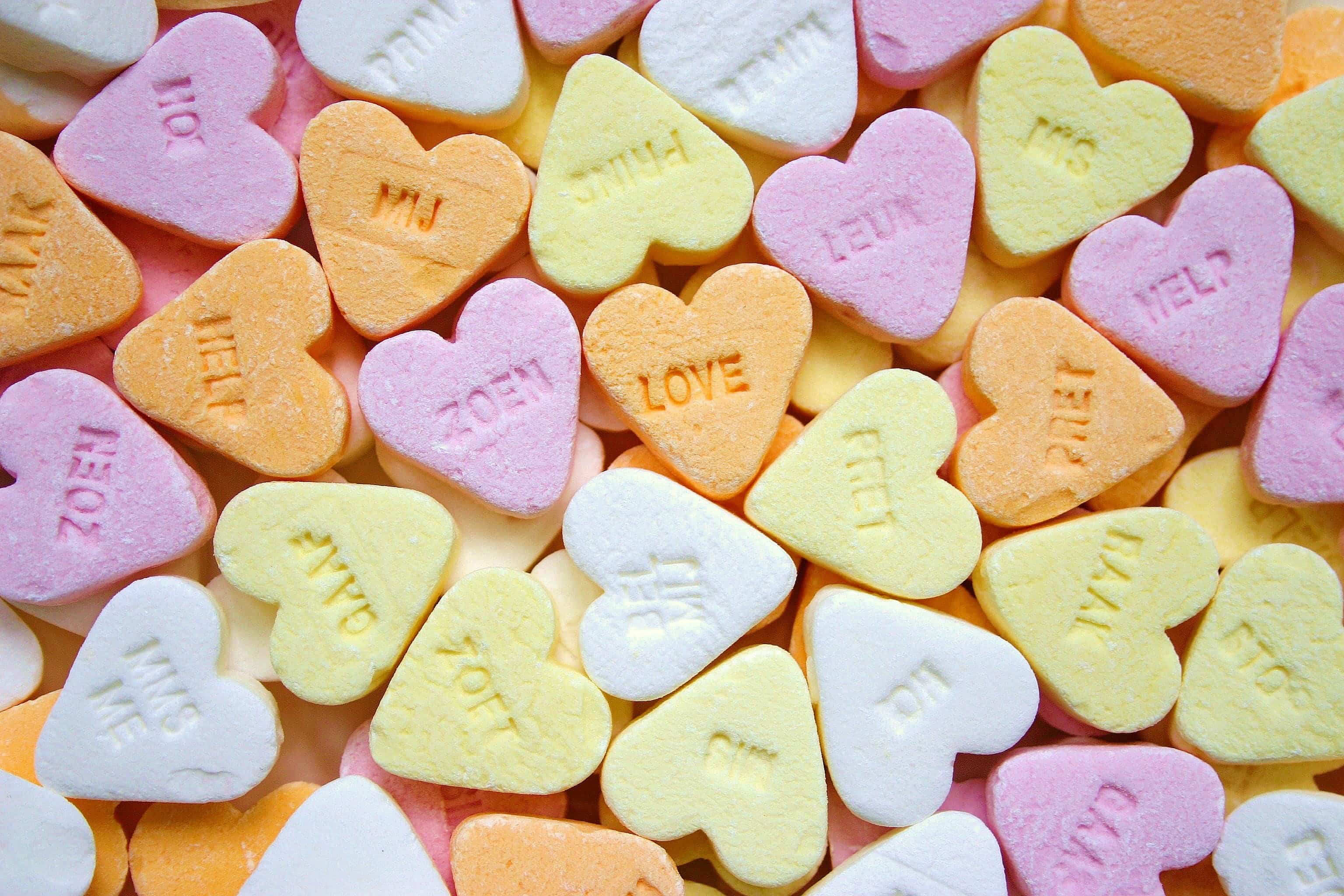 A selection of heart candies  with romantic messages on them