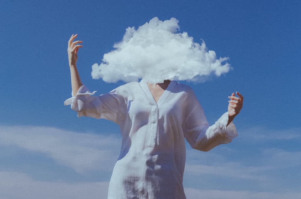 A woman with her head in the clouds
