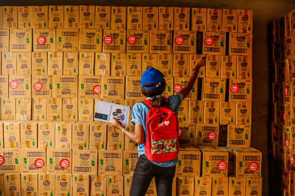 woman-counting-boxes-at-lagos-food-bank-initiative