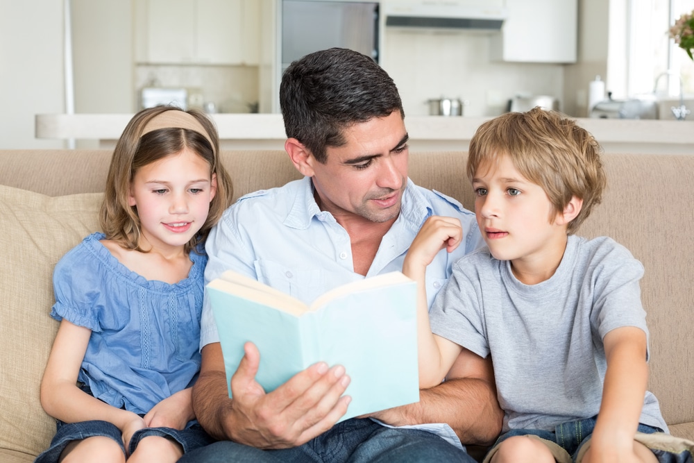 dad-reading-book-to-kids