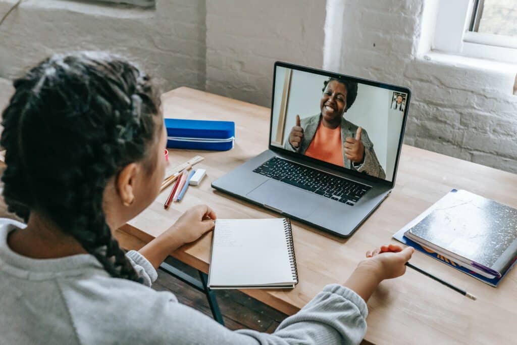 Photo by Katerina Holmes: https://www.pexels.com/photo/ethnic-girl-having-video-chat-with-teacher-online-on-laptop-5905709/
