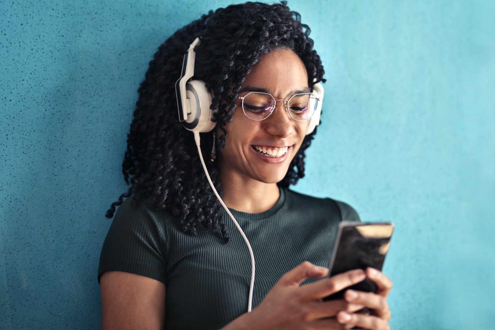 Woman listening to music on her headphones