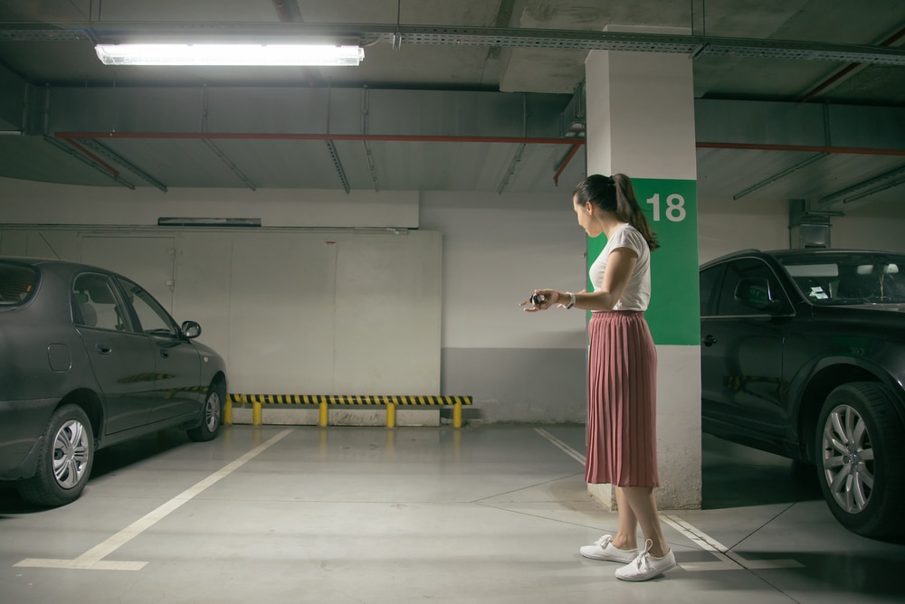 woman-confused-unable-to-find-her-car-looking-at-an-empty-space-in-the-parking-lot