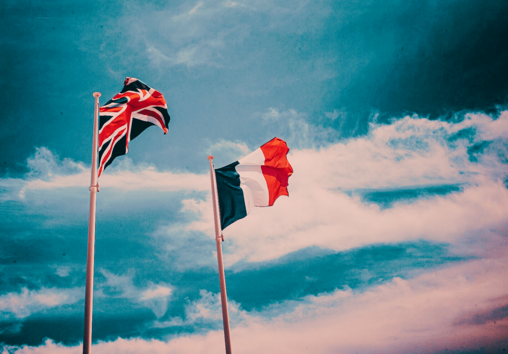 waving-flags-of-france-and-the-united-kingdom