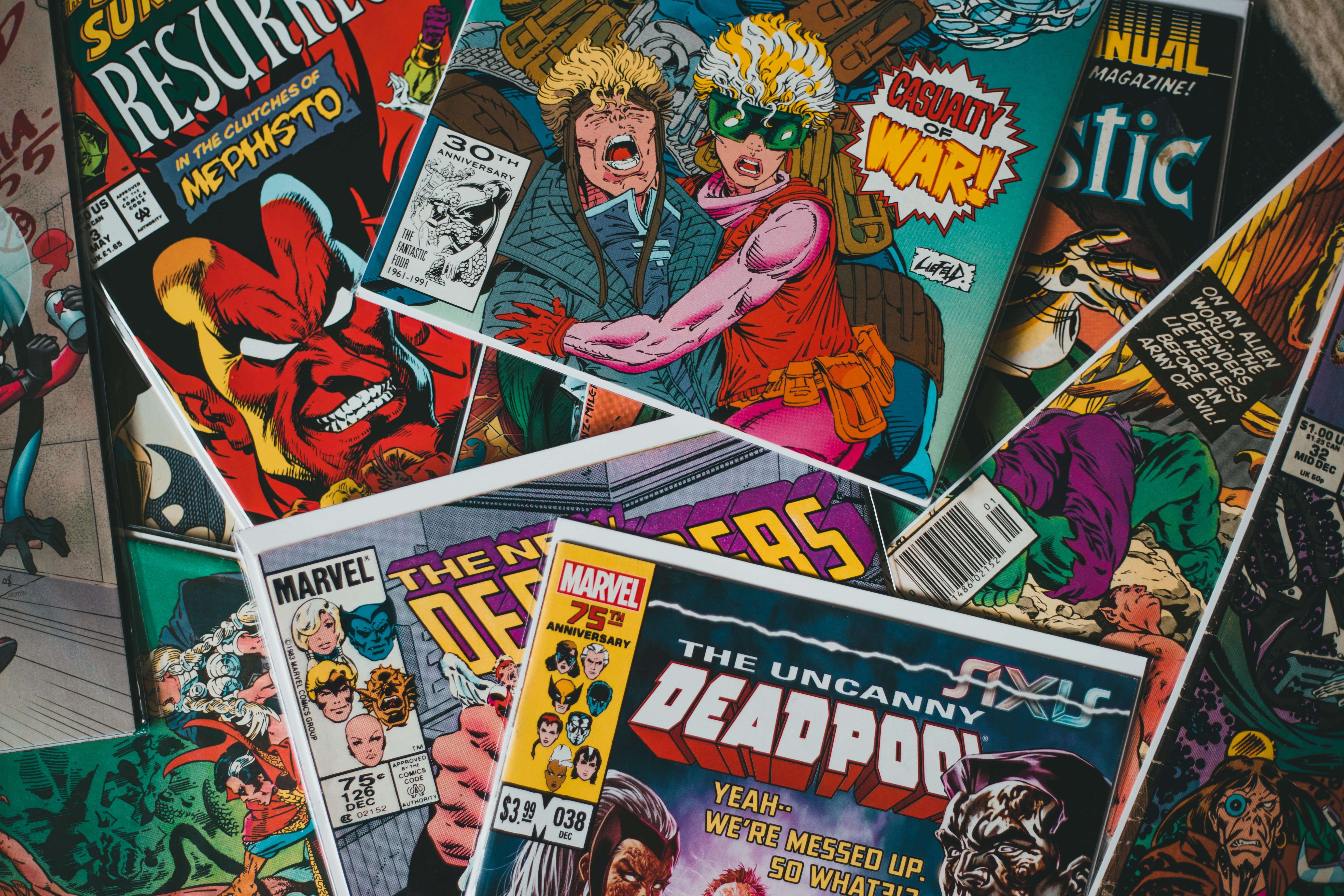 A collection of comic books laid out on a table