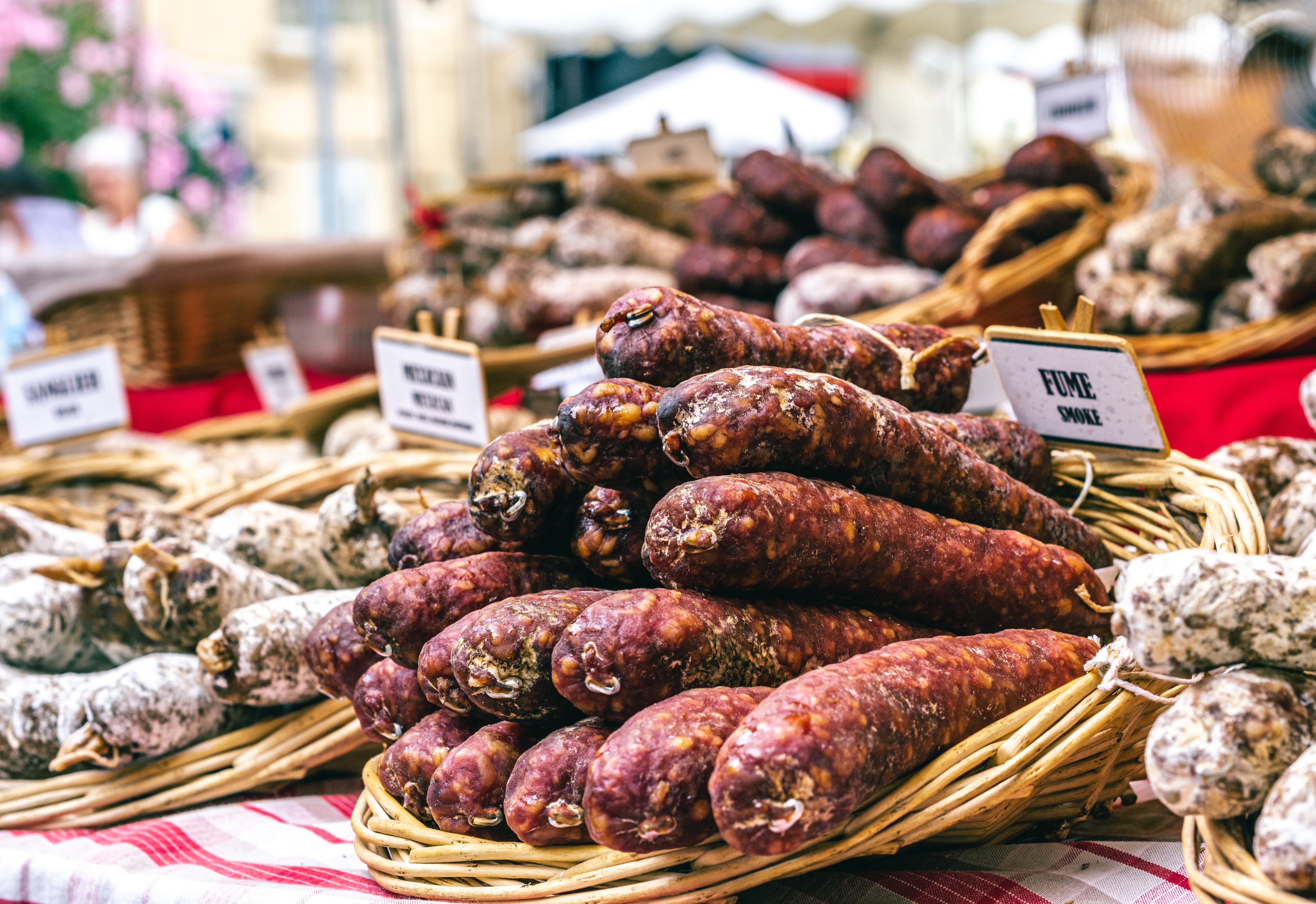 A basket of sausages at a French market