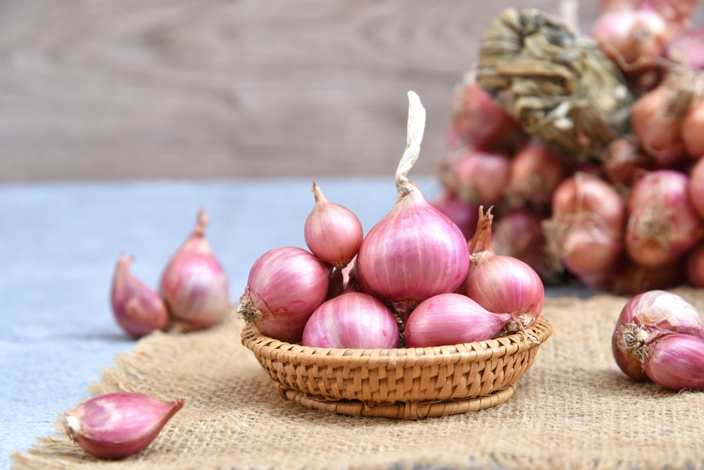red-onions-in-wicker-basket