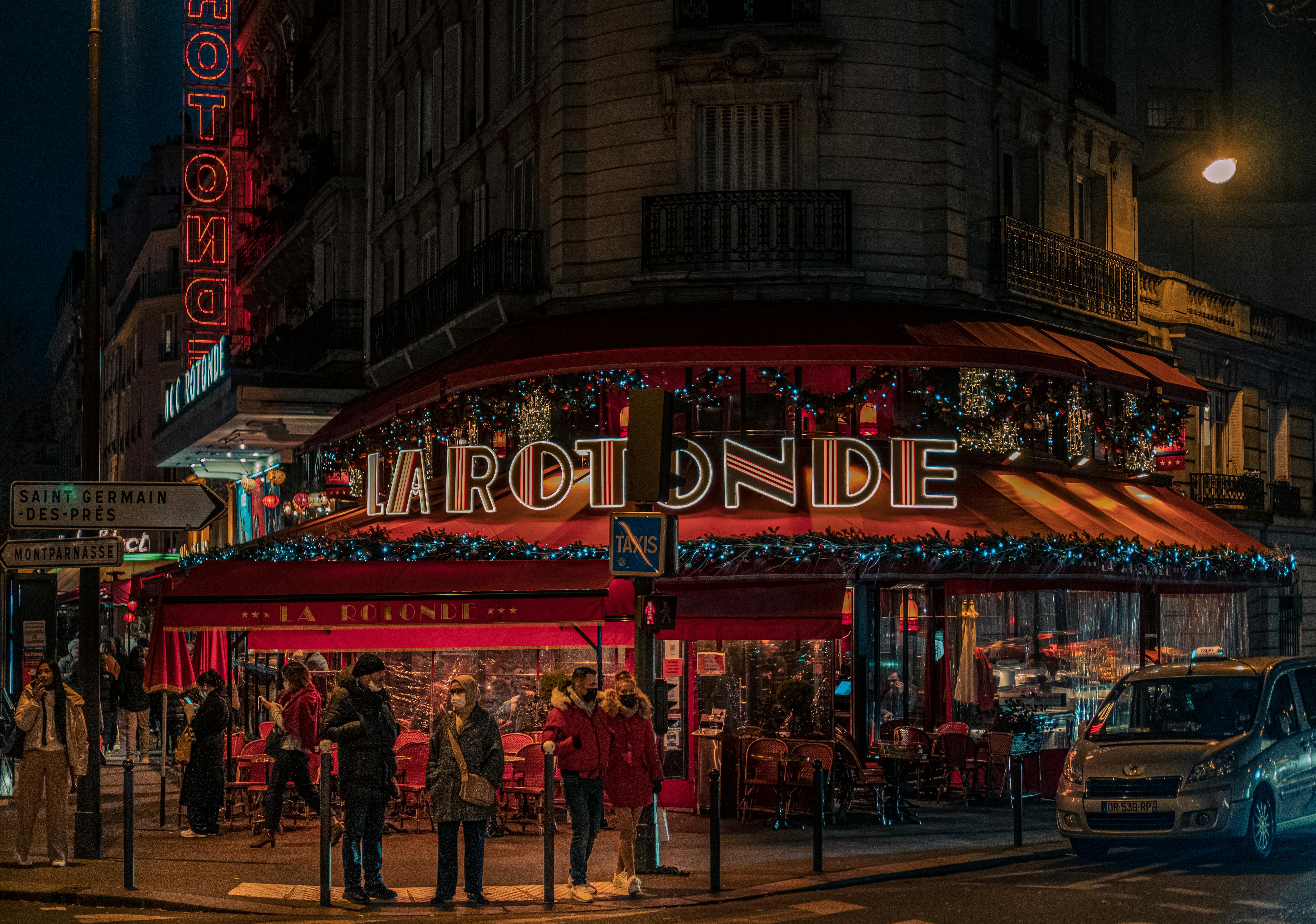 A busy Parisian cafe at night