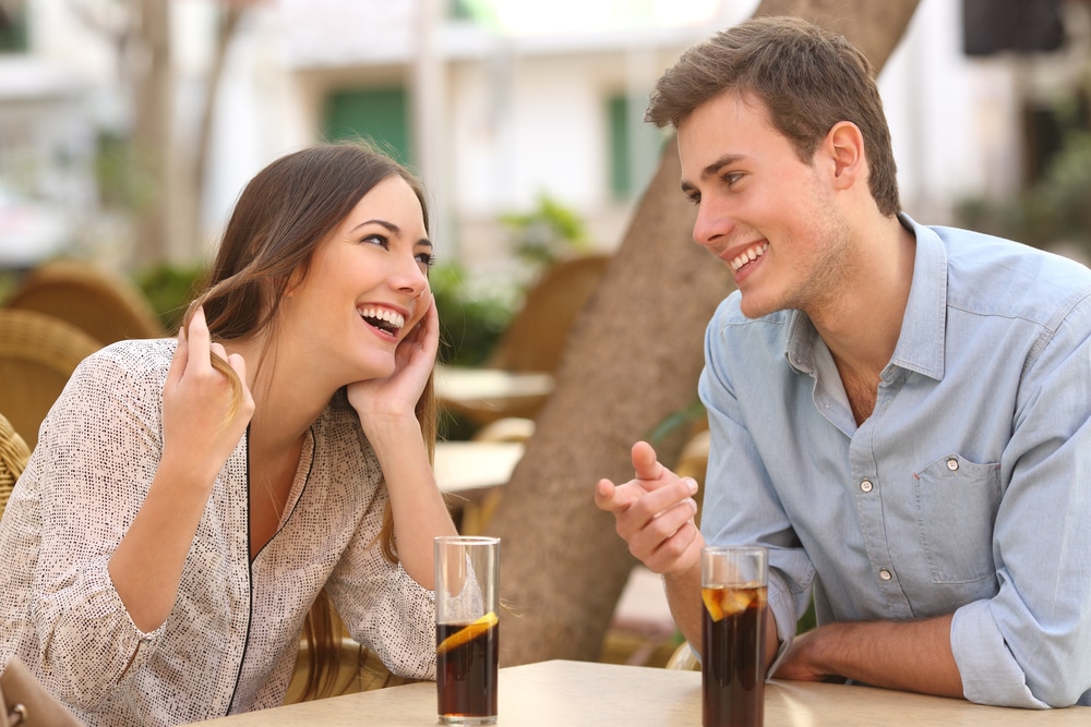 young-couple-smiling-and-talking