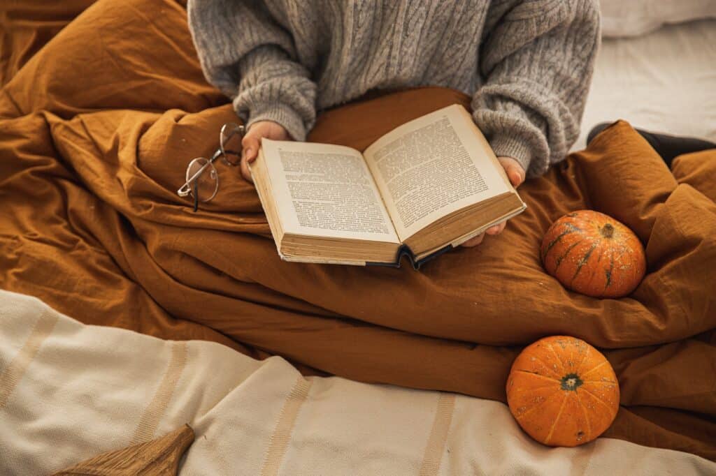 person-reading-a-book-autumn-theme