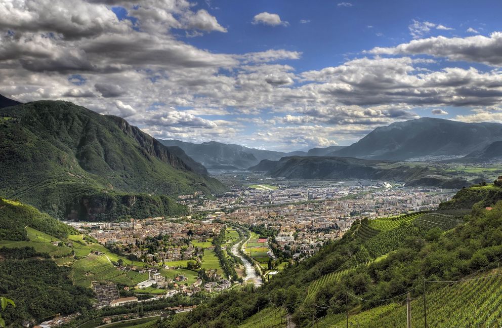 The view of Bolzano, Italy sitting in a valley.