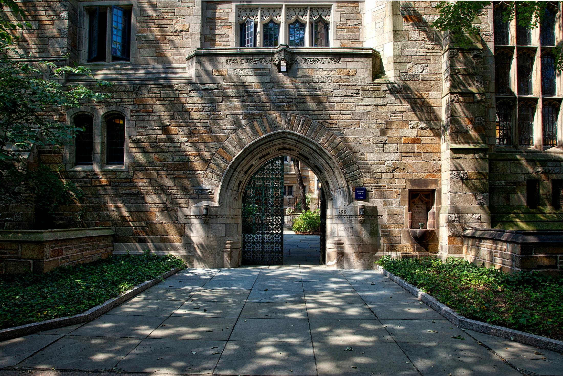 A classic stone university building on campus