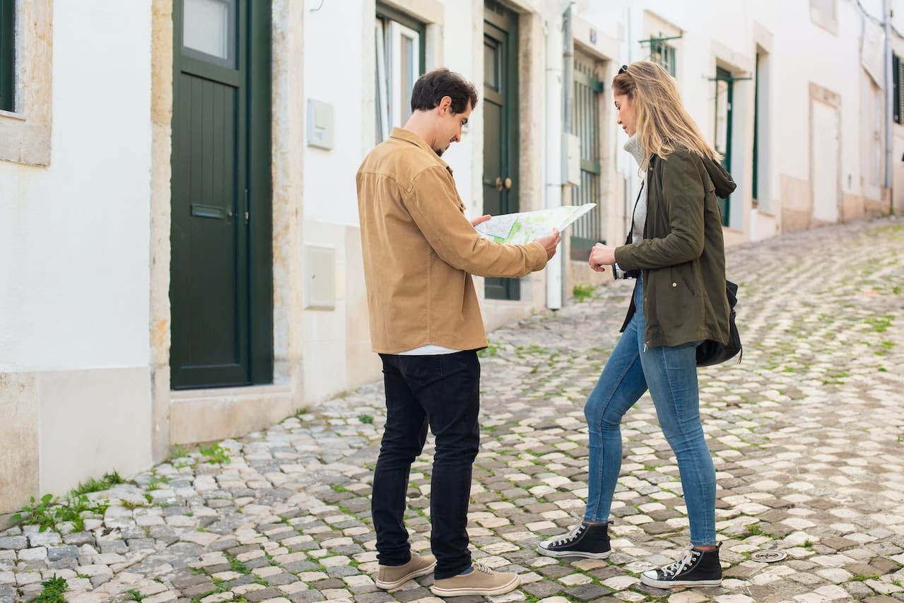 man-and-woman-looking-for-directions-on-a-map