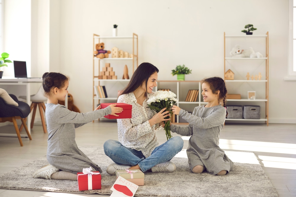 young-girls-giving-gifts-to-mom