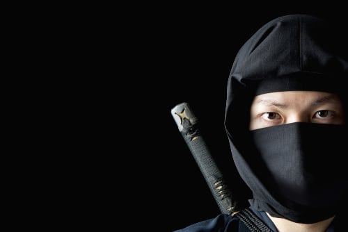 Portrait of a ninja with black background