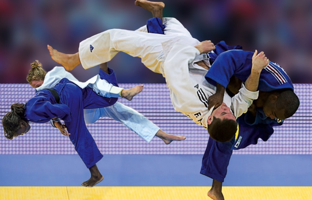 Two pairs of judo opponents performing throws
