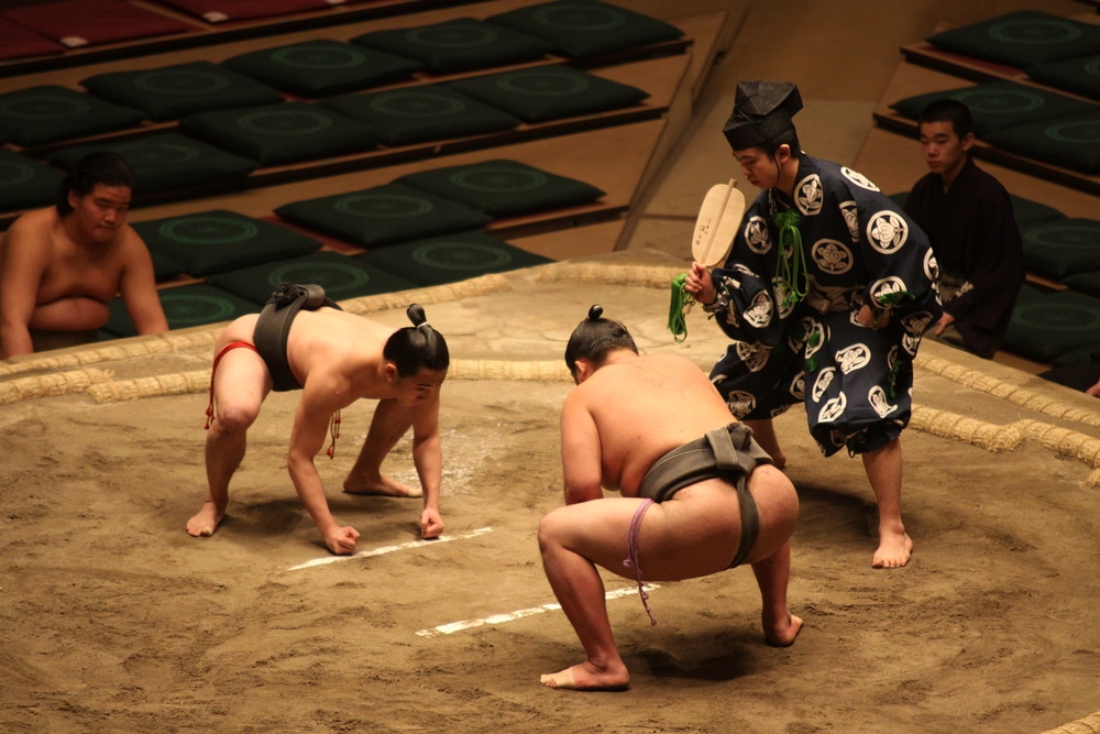 Sumo wrestlers facing off