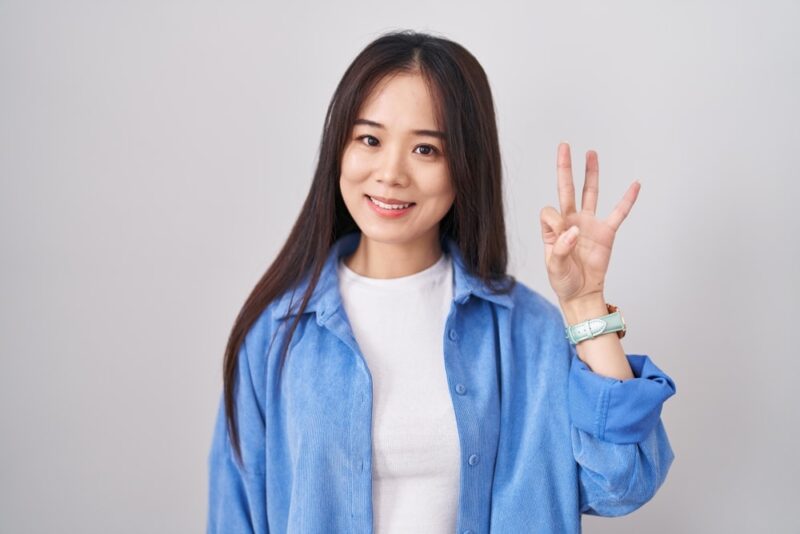 
asian-woman-showing-number-three-with-fingers-finger-counting