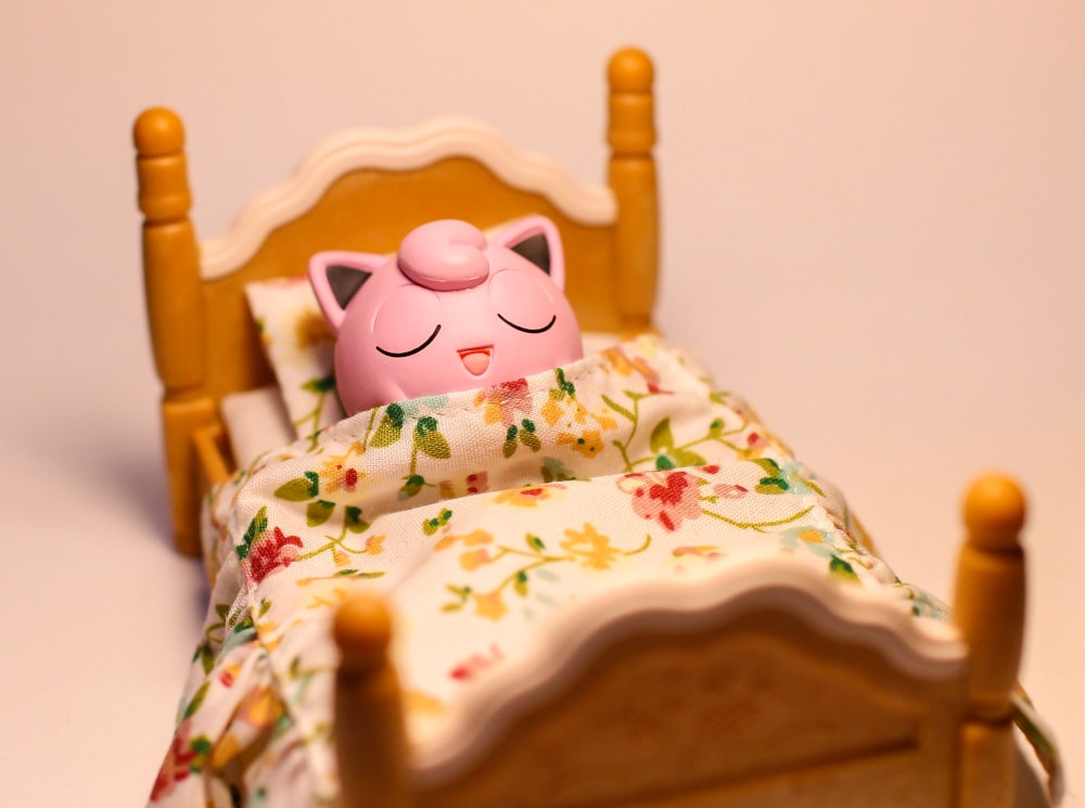 jigglypuff sleeping in bed