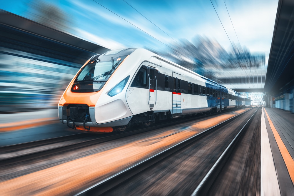 High,Speed,Train,In,Motion,On,The,Railway,Station