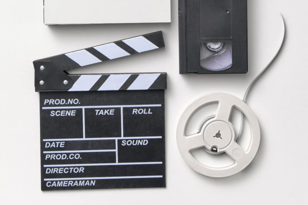 Movie board and film on a table