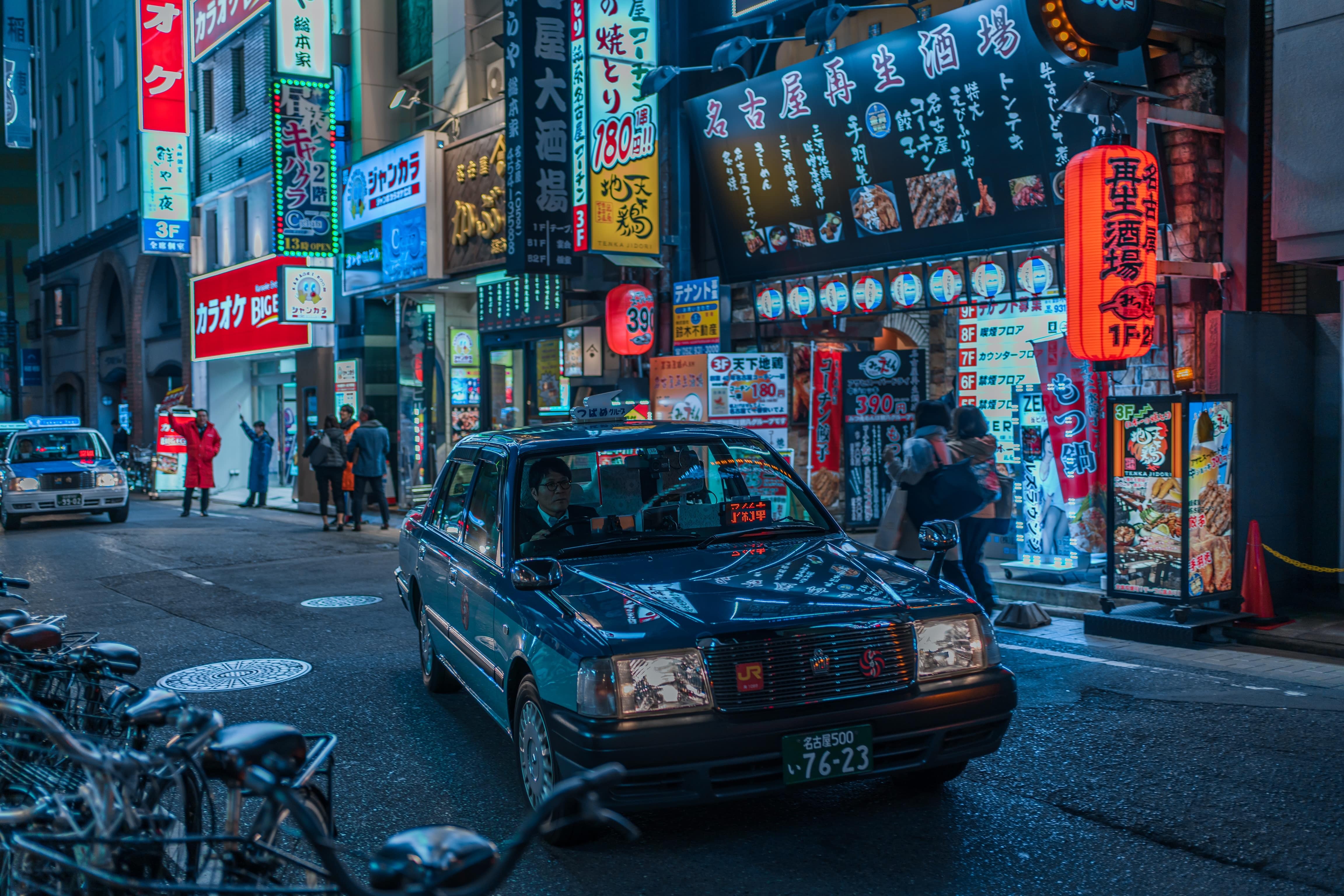 A taxi makes its way through Nagoya Japan