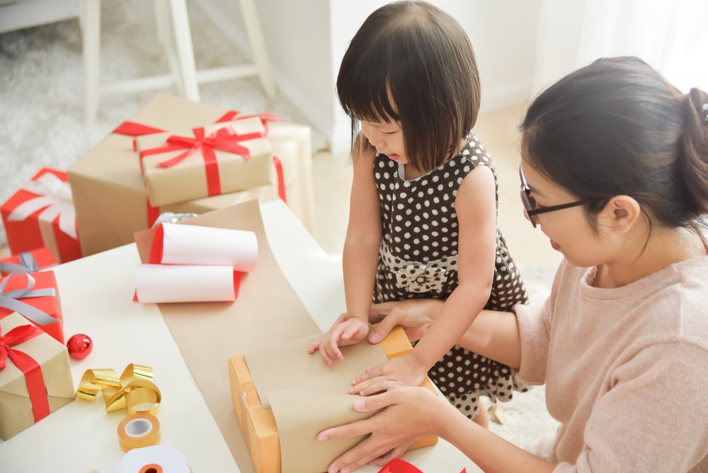 japanese mom and daughter wrapping presents