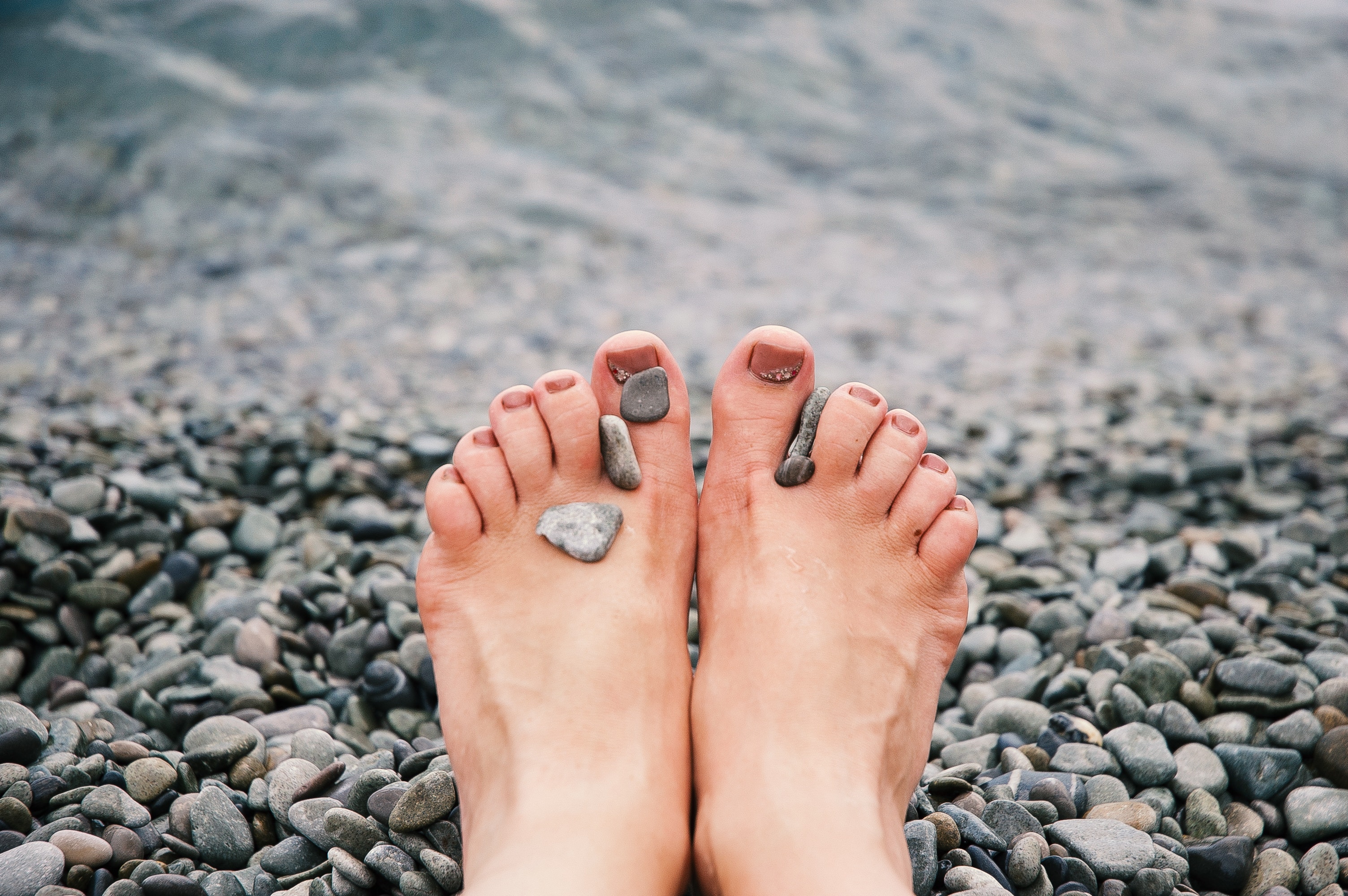 A woman's feet by the seaside